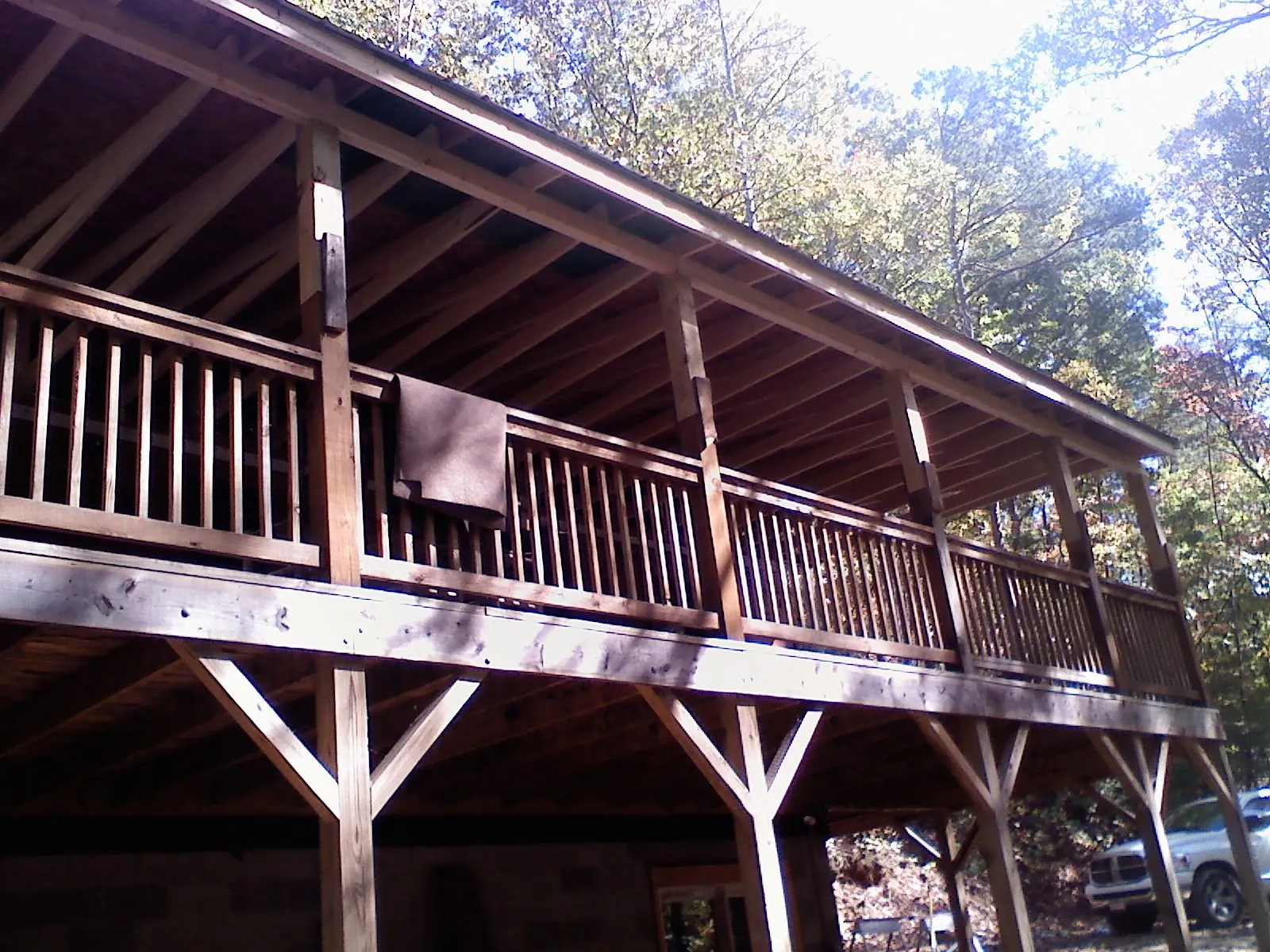 Timber framing under a new elevated porch and deck — Roof Leak Repair in Britt by Roofing Brothers